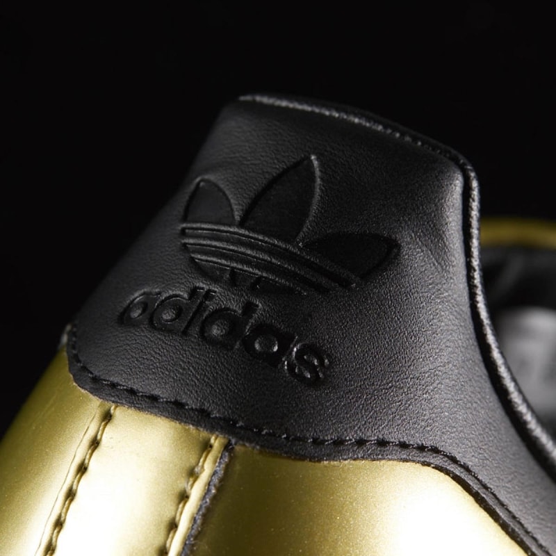 Adidas preto store com dourado feminino