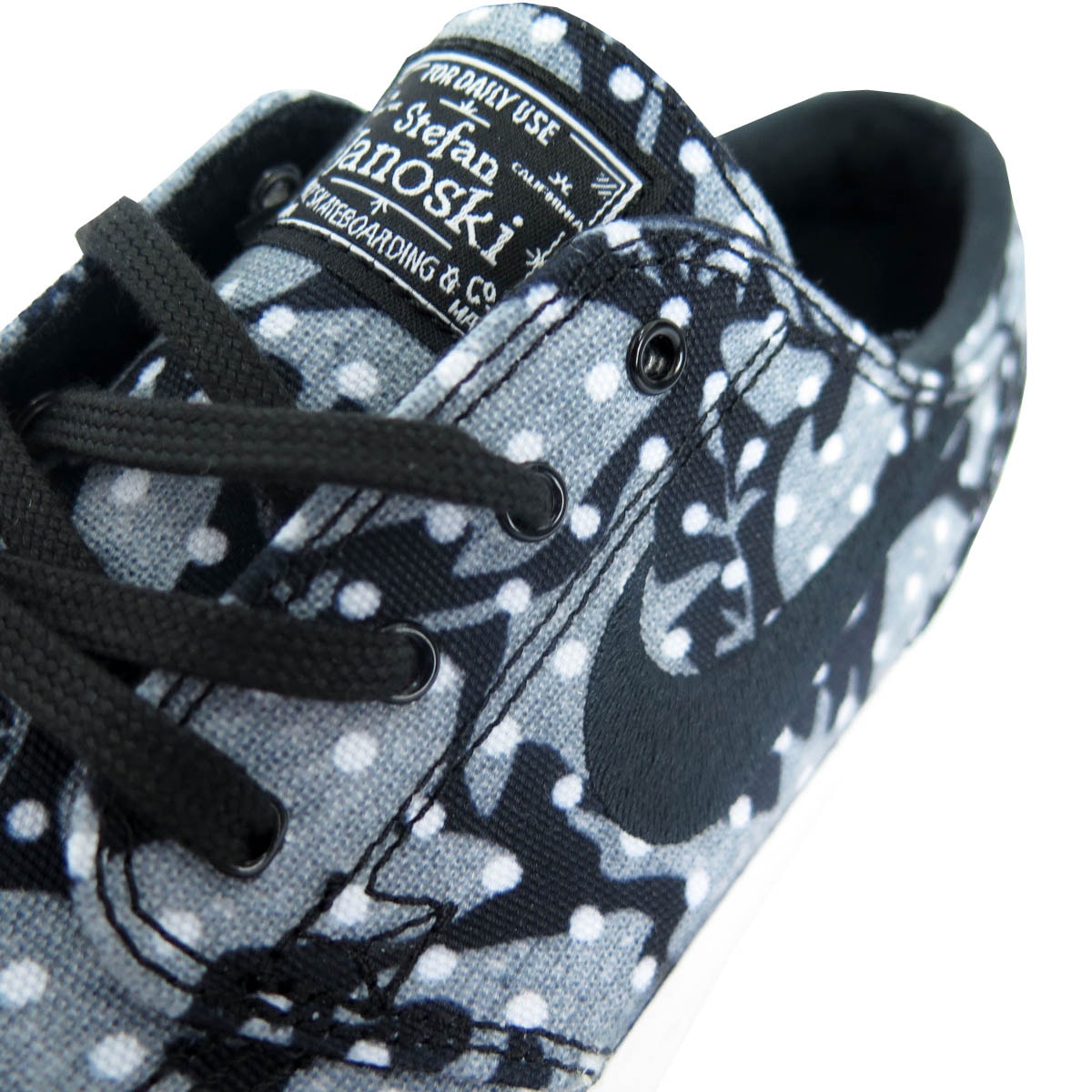 Janoski preto e store cinza